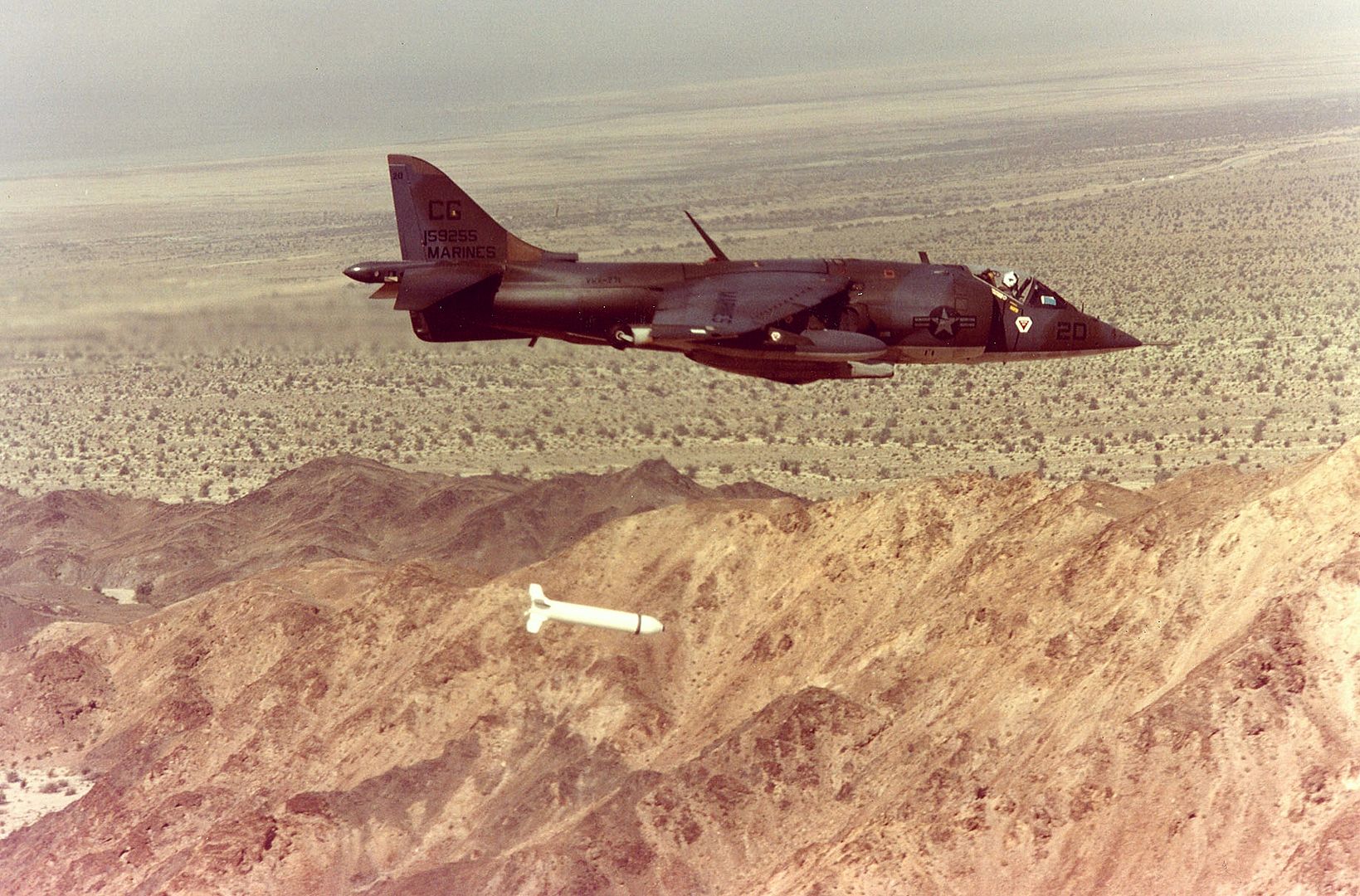 AV-8A_Harrier_of_VMA-231_drops_Rockeye_bomb_in_1979_zpsqojbbqqy.jpg